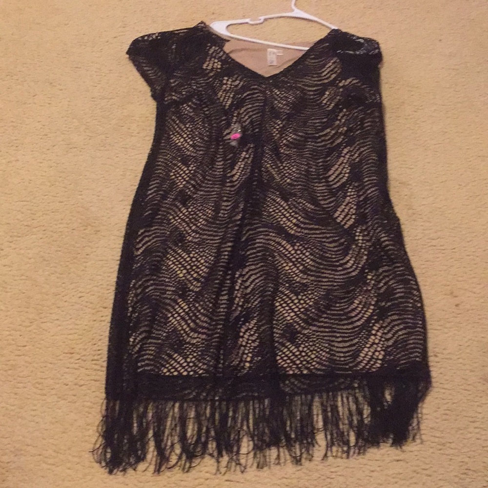 Black dress with beige under slip